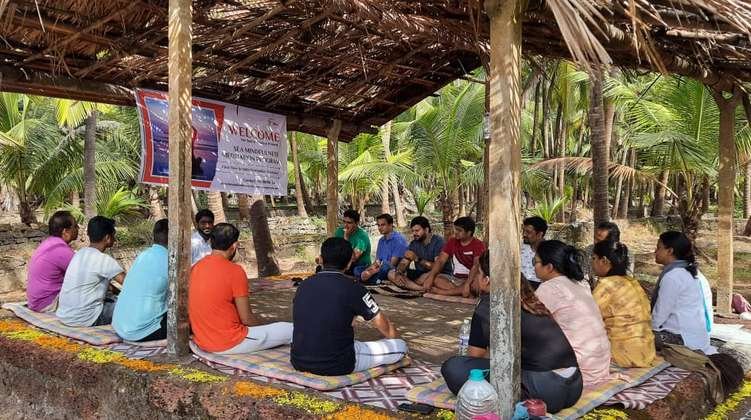 Participants engaged in group meditation at our mindfulness retreat